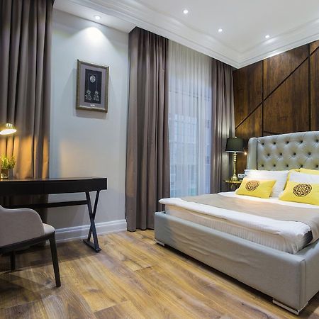 Qonaq Hotel Astana Bagian luar foto