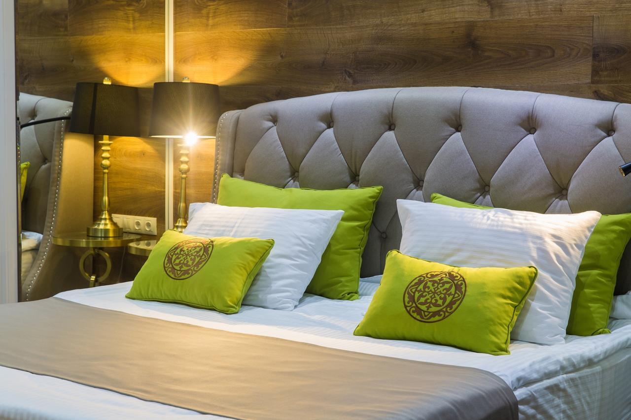 Qonaq Hotel Astana Bagian luar foto