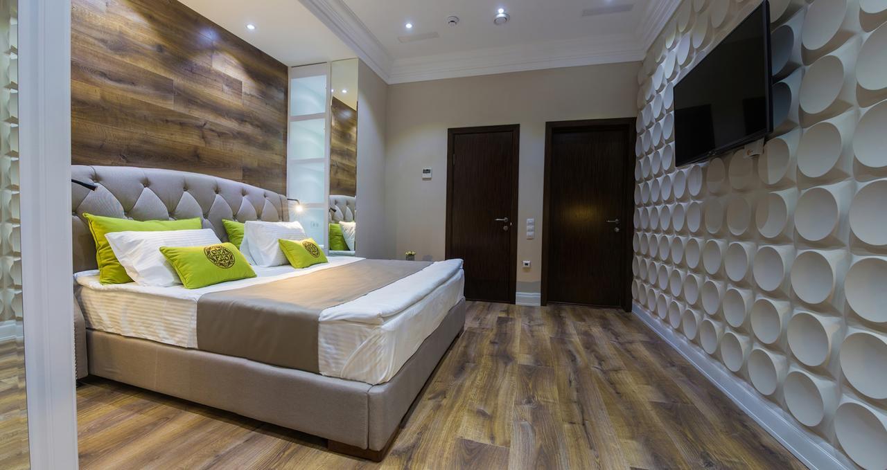 Qonaq Hotel Astana Bagian luar foto