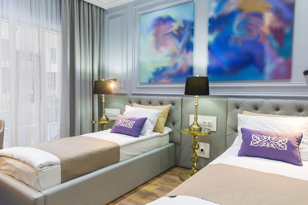 Qonaq Hotel Astana Bagian luar foto