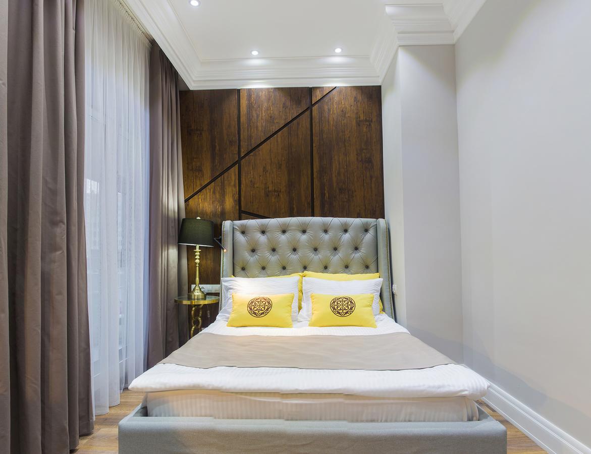 Qonaq Hotel Astana Bagian luar foto