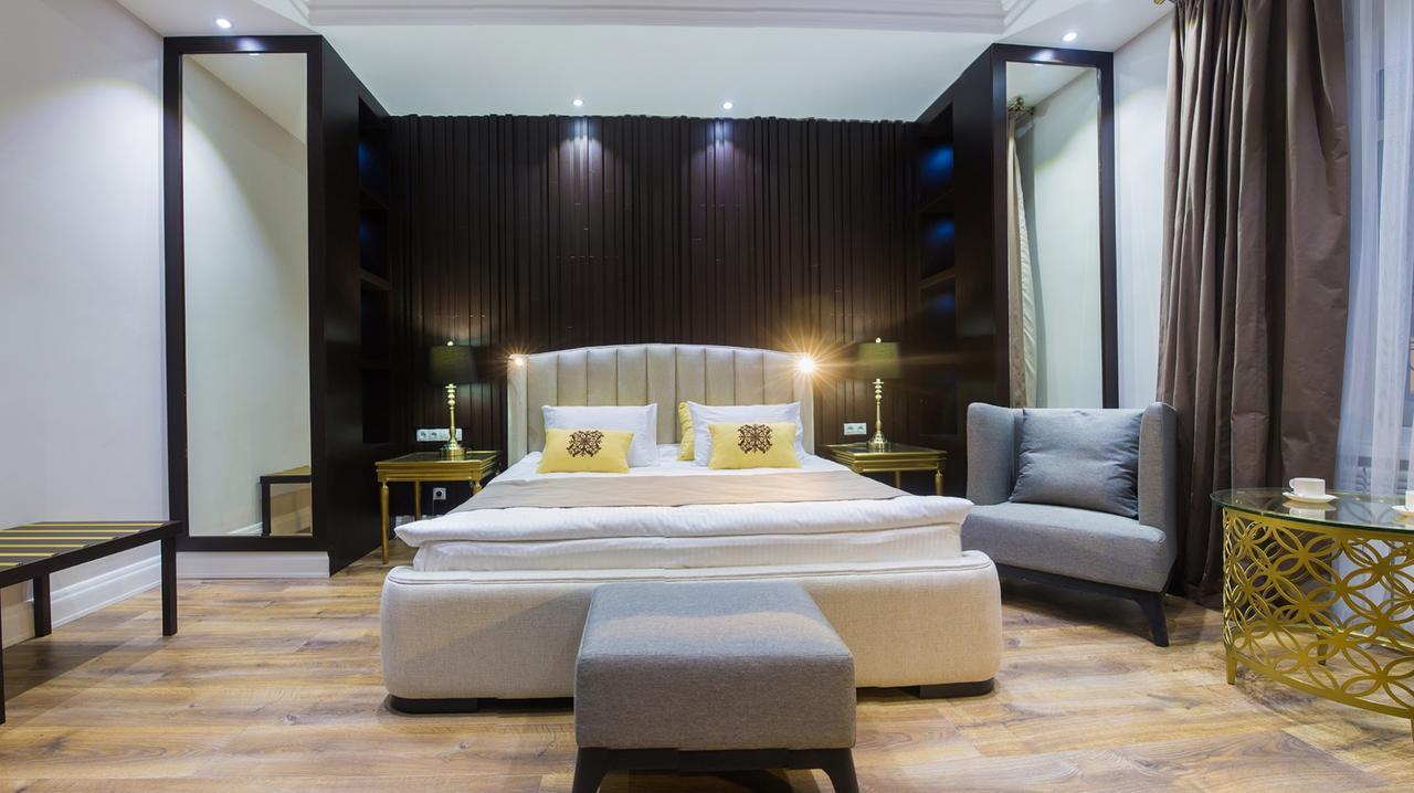 Qonaq Hotel Astana Bagian luar foto